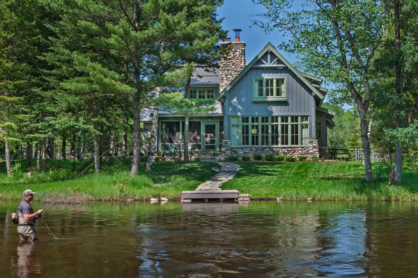 A New Home on the Au Sable River Blends Seamlessly Into its Surroundings